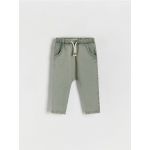 Pantaloni de trening cu efect prespalat - verde-oliv deschis