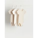 Set de 3 body-uri din material structurat - nude