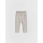Pantaloni de trening cu efect prespalat - gri deschis