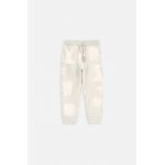 Coccodrillo pantaloni de trening pentru copii ZC3122701SBN culoarea bej, cu imprimeu