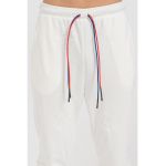Pantaloni de trening cu croiala conica si snururi de ajustare
