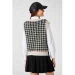 Vesta cu model houndstooth supradimensionat