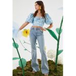 Blugi evazati cu motive florale brodate