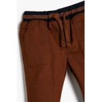 Pantaloni conici cu snur