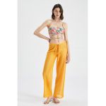 Pantaloni semitransparenti de plaja