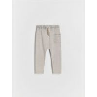 Pantaloni de trening cu efect prespalat - gri deschis