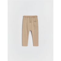 Pantaloni de trening cu efect prespalat - bej