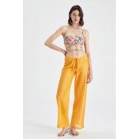 Pantaloni semitransparenti de plaja