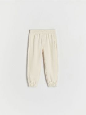 Pantaloni jogger din bumbac - nude