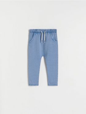 Pantaloni de trening cu efect prespalat - albastru