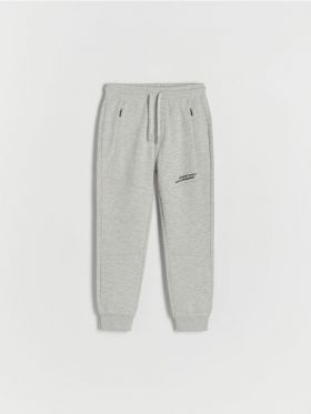 Pantaloni jogger cu detalii tip fermoar - gri deschis