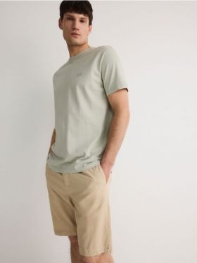 Pantaloni scurti chino, uni - crem