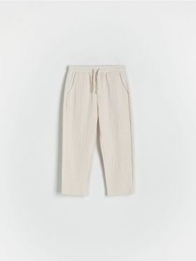 Pantaloni chino din jerseu - crem
