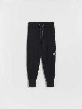 Pantaloni de bumbac Jogger - negru