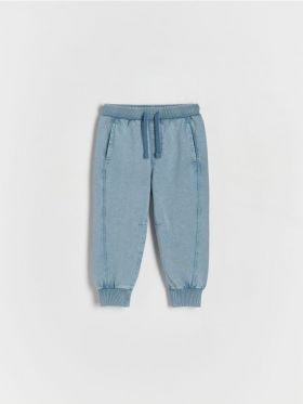 Pantaloni sport cu efect prespalat - albastru