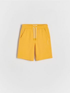 Pantaloni scurti din bumbac cu buzunare - galben