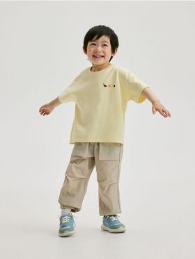 Tricou oversized cu imprimeu - galben