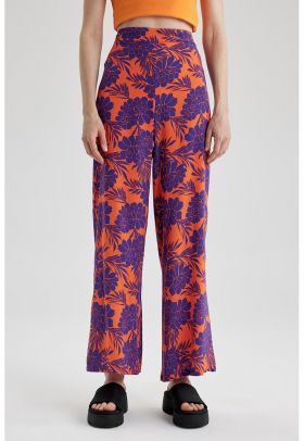 Pantaloni ampli cu imprimeu floral