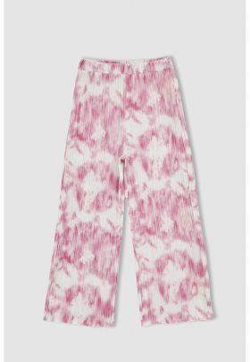 Pantaloni tie-dye evazati