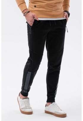 Pantaloni sport cu buzunare cu fermoar