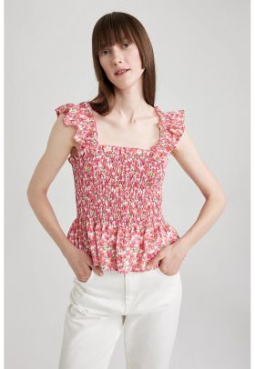 Bluza cu imprimeu floral si terminatie evazata