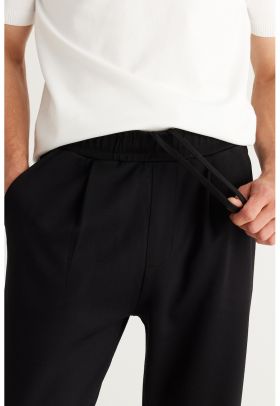 Pantaloni de trening relaxed fit cu buzunare laterale