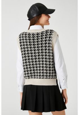 Vesta cu model houndstooth supradimensionat