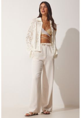 Pantaloni ampli cu talie inalta