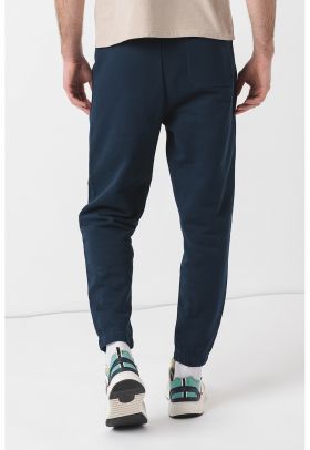 Pantaloni de trening crop cu croiala conica