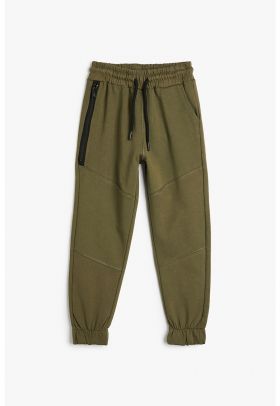 Pantaloni conici de trening cu snur