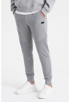 Pantaloni de trening cu croiala conica si snur de ajustare