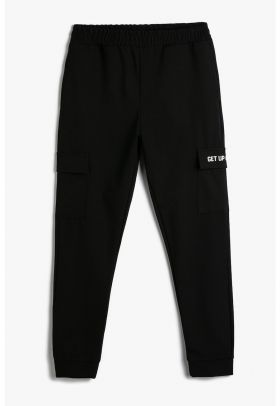 Pantaloni de trening cu buzunare cu clapa