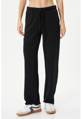 Pantaloni de trening cu buzunare laterale