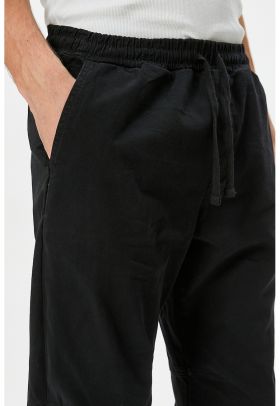 Pantaloni relaxed fit cu snur de ajustare