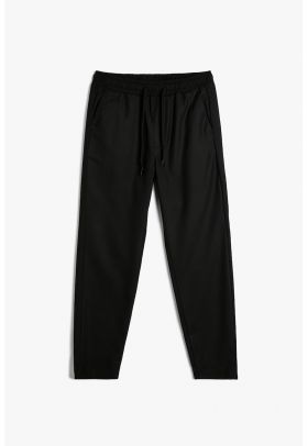 Pantaloni slim fit cu talie elastica