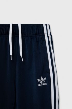 adidas Originals pantaloni de trening pentru copii culoarea albastru marin, cu imprimeu