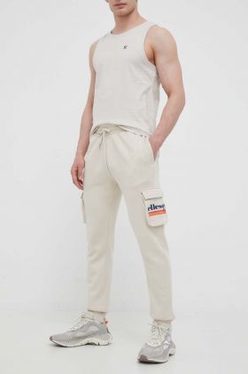 Ellesse pantaloni de trening culoarea bej, cu imprimeu