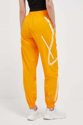 adidas by Stella McCartney pantaloni de antrenament TruePace culoarea portocaliu, cu imprimeu