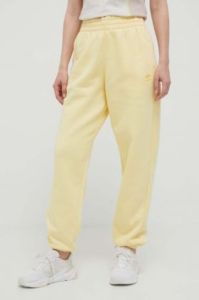 adidas Originals pantaloni de trening culoarea galben, neted