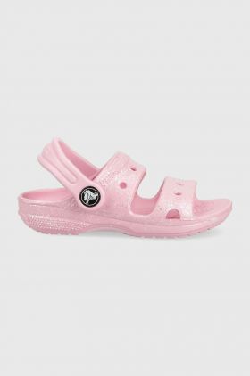 Crocs slapi copii CROCS CLASSIC GLITTER SANDAL culoarea roz