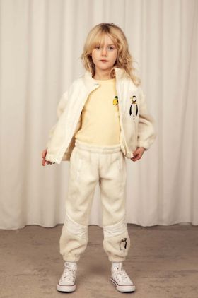 Mini Rodini pantaloni de trening pentru copii culoarea bej, cu imprimeu