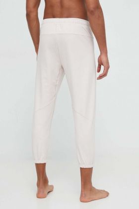 adidas Performance pantaloni de antrenament Designed for Training culoarea roz, uni IU4604