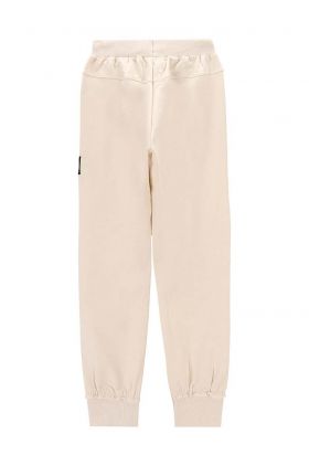 Coccodrillo pantaloni de trening din bumbac pentru copii culoarea bej, modelator