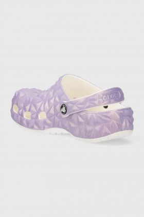 Crocs slapi copii CLASSIC IRIDESCENT GEO CLOG culoarea violet