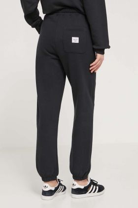 Herschel pantaloni de trening din bumbac culoarea negru, neted